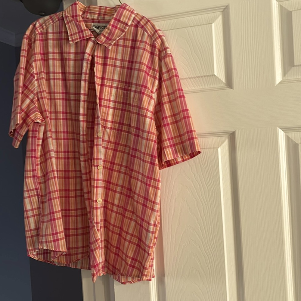 Pink and peach colored button down shirt